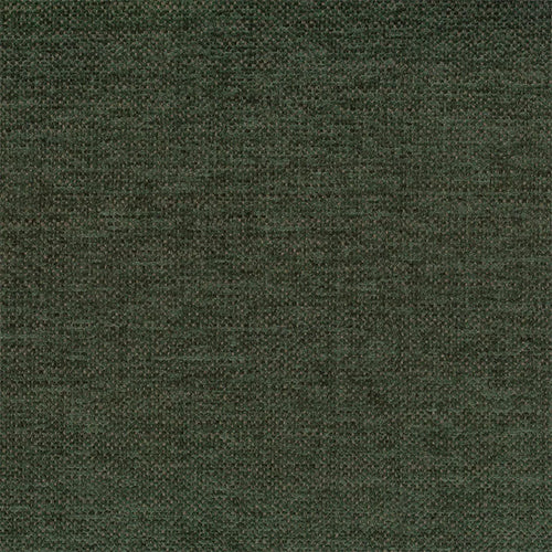 Warwick Marais foam chair in forest green, showcasing its sleek design and plush cushioning in a cozy setting.
